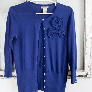 Royal blue fitted cardigan with crochet flower